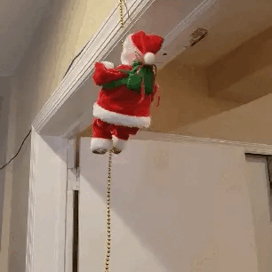 Nest&Glow® Père Noël Grimpant